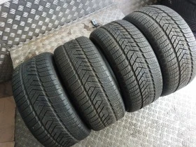 Гуми Зимни 255/40R19, снимка 1 - Гуми и джанти - 42828684