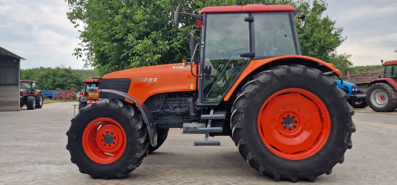 Трактор Kubota M128X - изображение 2