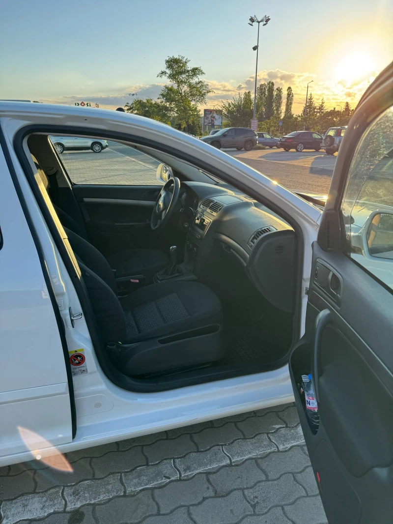 Skoda Octavia бензин-газ, снимка 13 - Автомобили и джипове - 50499463