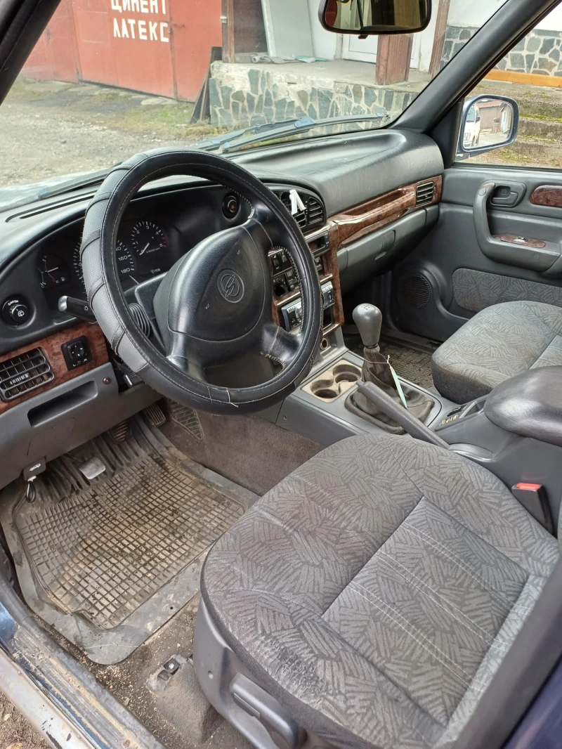 SsangYong Musso 2.9D, снимка 3 - Автомобили и джипове - 48587841