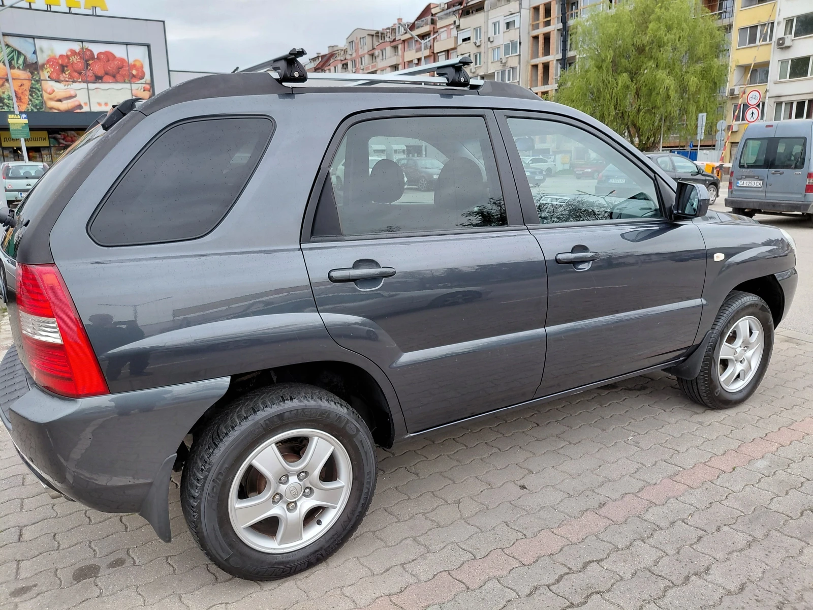 Kia Sportage, снимка 12 - Автомобили и джипове - 54573495