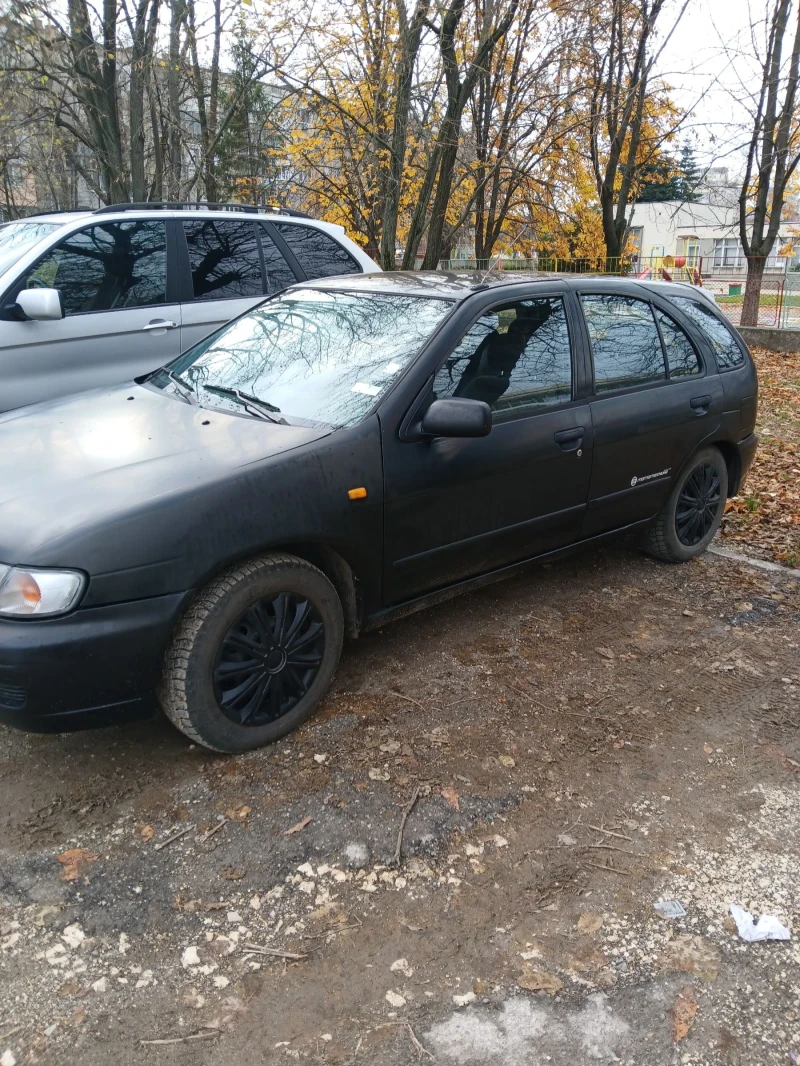 Nissan Almera, снимка 9 - Автомобили и джипове - 48216239