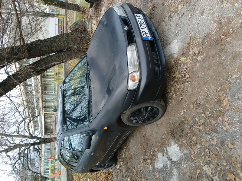 Nissan Almera, снимка 6 - Автомобили и джипове - 48216239