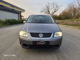     VW Touran    ,  