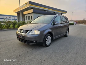     VW Touran    ,  