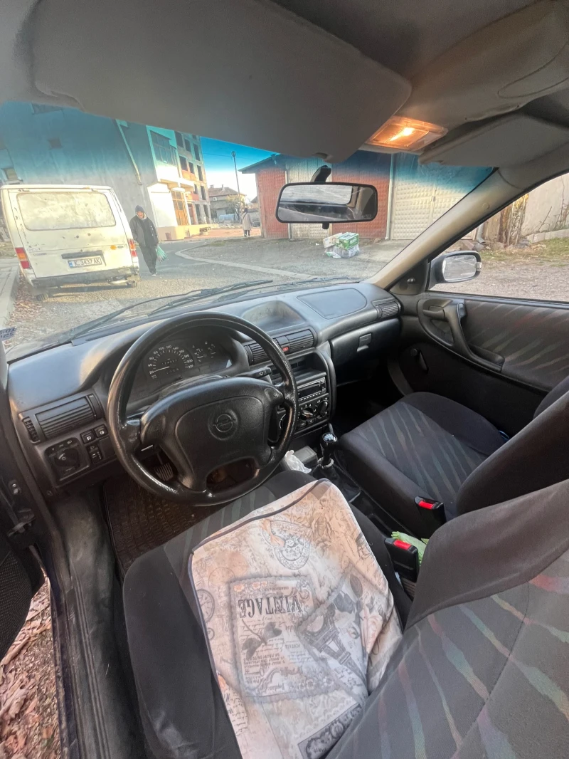 Opel Astra Бензин+ газ, снимка 7 - Автомобили и джипове - 48028023