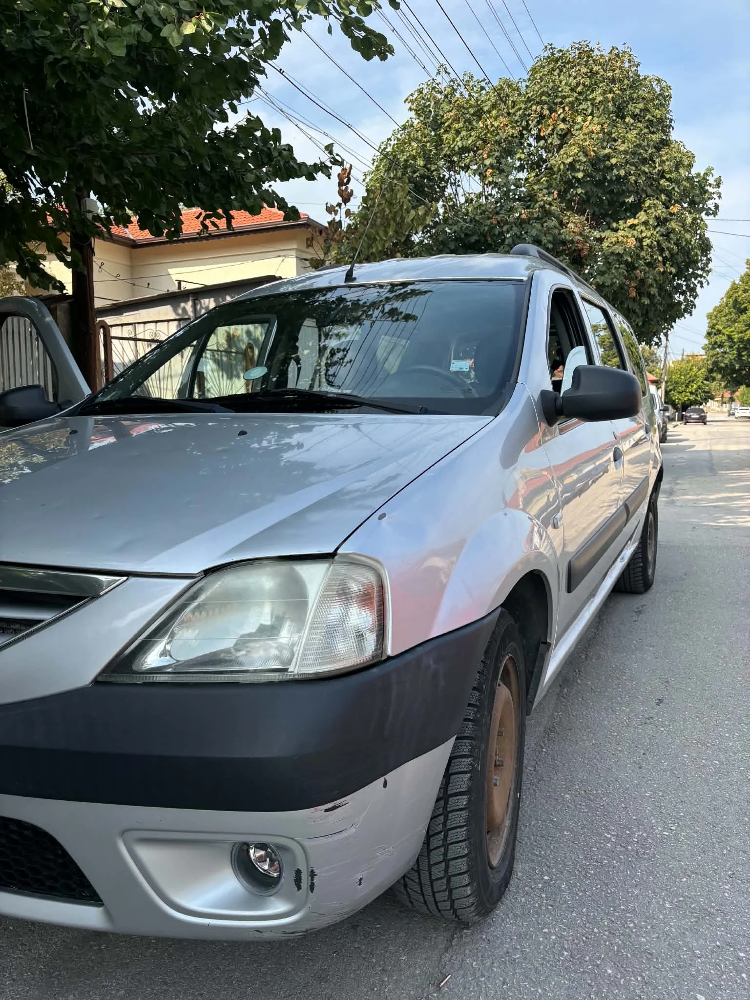 Dacia Logan 1.5dci, снимка 12 - Автомобили и джипове - 56144117