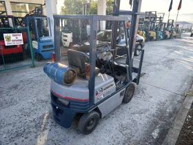 ����� �� �������� �� ������� Komatsu  1000kg na 4 metra