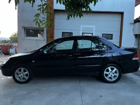 Mitsubishi Lancer 1.6 бензин 98кс нова от бг, снимка 4