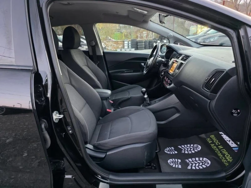 Kia Rio 1.25i 88K.C. / НАВИ / КЛИМАТИК / КАМЕРА, снимка 8 - Автомобили и джипове - 52646936