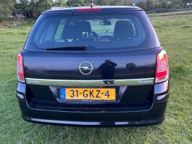 Opel Astra, снимка 7 - Автомобили и джипове - 45482038