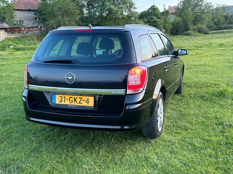 Opel Astra, снимка 1 - Автомобили и джипове - 46069636