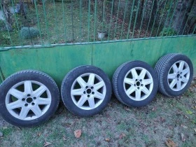 Гуми с джанти Bridgestone 205/55R16, снимка 1 - Гуми и джанти - 46912133