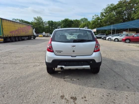     Dacia Sandero 1.6i-, 