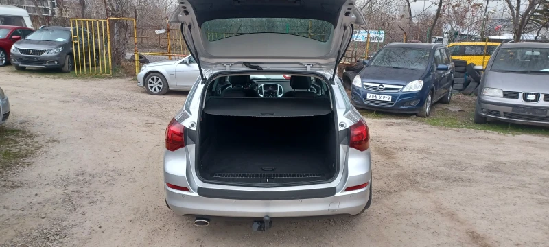 Opel Astra 1, 4 benzin 140 кс., снимка 11 - Автомобили и джипове - 49473906