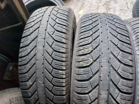 Гуми Зимни 235/65R17, снимка 2 - Гуми и джанти - 39129291