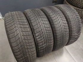 Гуми Зимни 215/65R17, снимка 5 - Гуми и джанти - 44702164