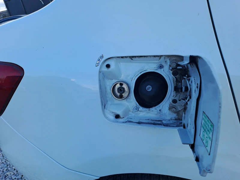 Dacia Logan 1, 2i, ГАЗ, 75кс, Климатик, снимка 15 - Автомобили и джипове - 53100456