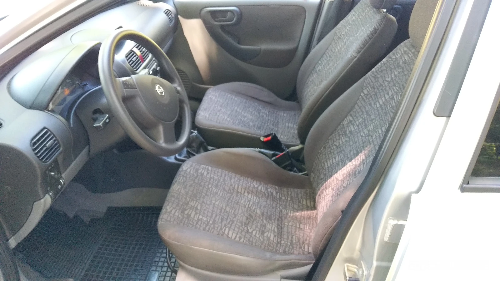Opel Corsa 1.2 Comfort, снимка 12 - Автомобили и джипове - 54722558