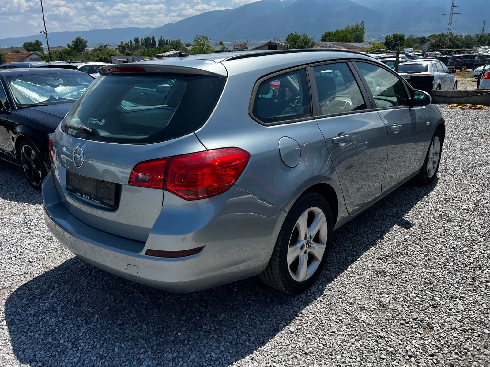 Opel Astra 1.6Бензин 115к.с. 99000 KM!!  EURO 5A, снимка 15 - Автомобили и джипове - 55466283