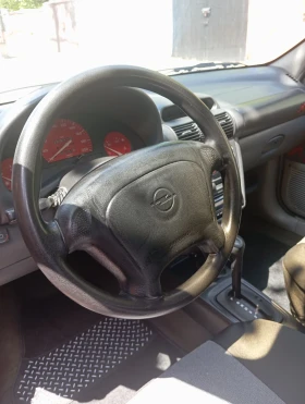 Opel Corsa 1.4 газ автоматик, снимка 6