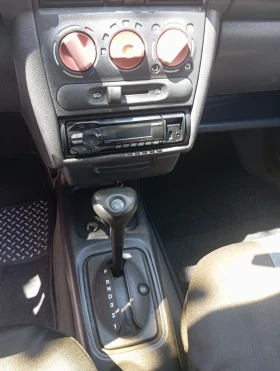 Opel Corsa 1.4 газ автоматик, снимка 7