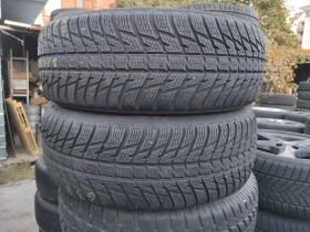 Гуми Зимни 235/65R17, снимка 3 - Гуми и джанти - 47834456