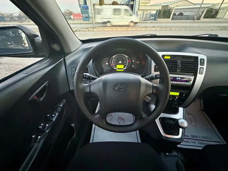 Hyundai Tucson 2.0CRDi, снимка 10 - Автомобили и джипове - 48020462