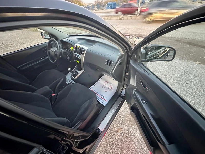 Hyundai Tucson 2.0CRDi, снимка 13 - Автомобили и джипове - 48020462