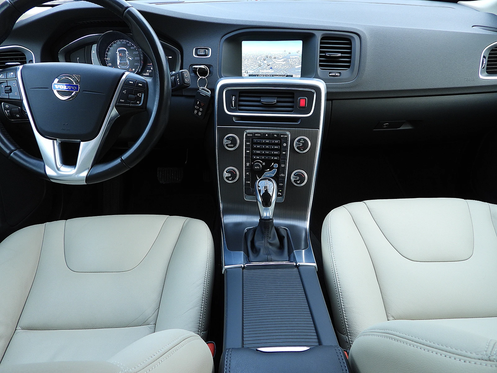 Volvo V60 2.0ШВЕЙЦАРИЯ-ДИСТРОНИК/КОЖА/НАВИ/LANE ASSIST/BLISS - изображение 9