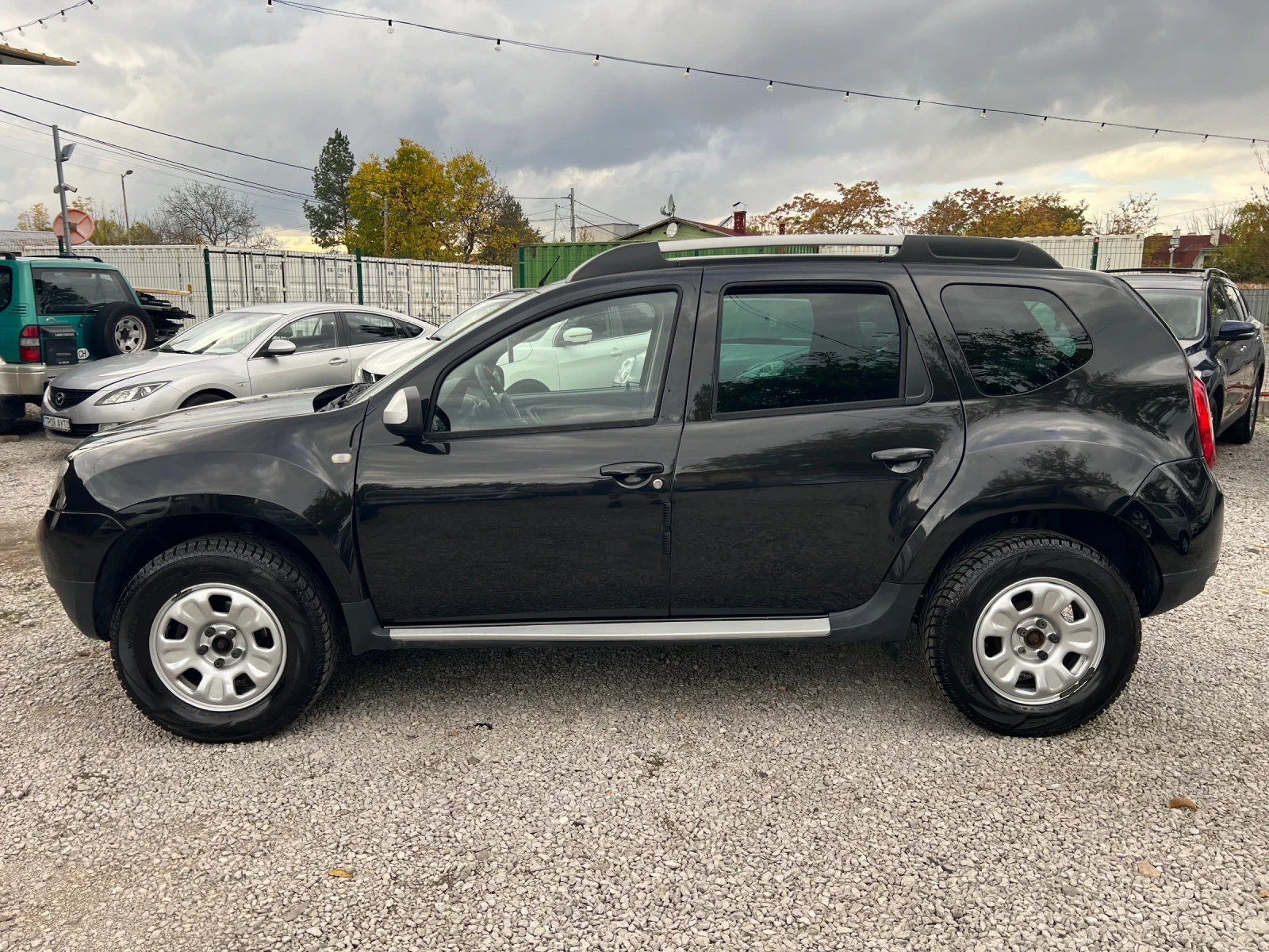 Dacia Duster 1.6i 4x4* ШВЕЙЦАРИЯ* , снимка 8 - Автомобили и джипове - 56708142