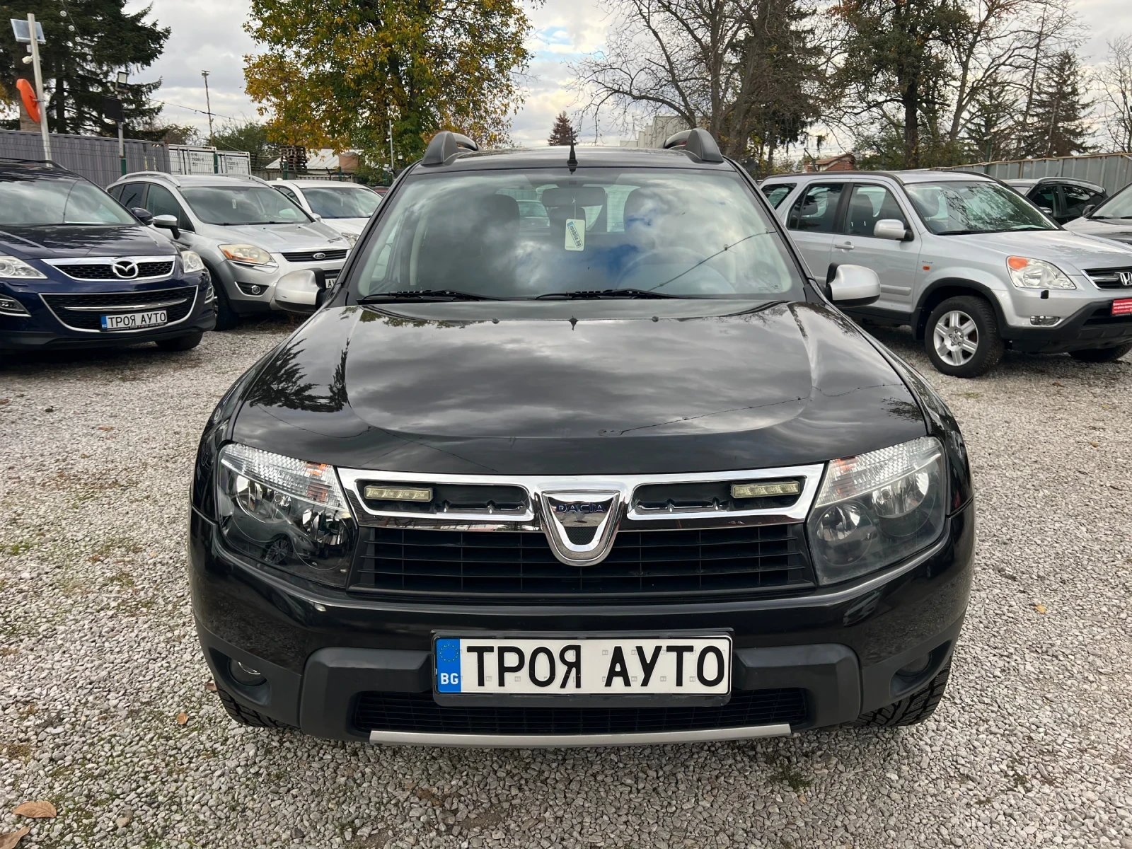 Dacia Duster 1.6i 4x4* ШВЕЙЦАРИЯ* , снимка 2 - Автомобили и джипове - 56708142