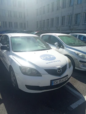 ������ Mazda 3