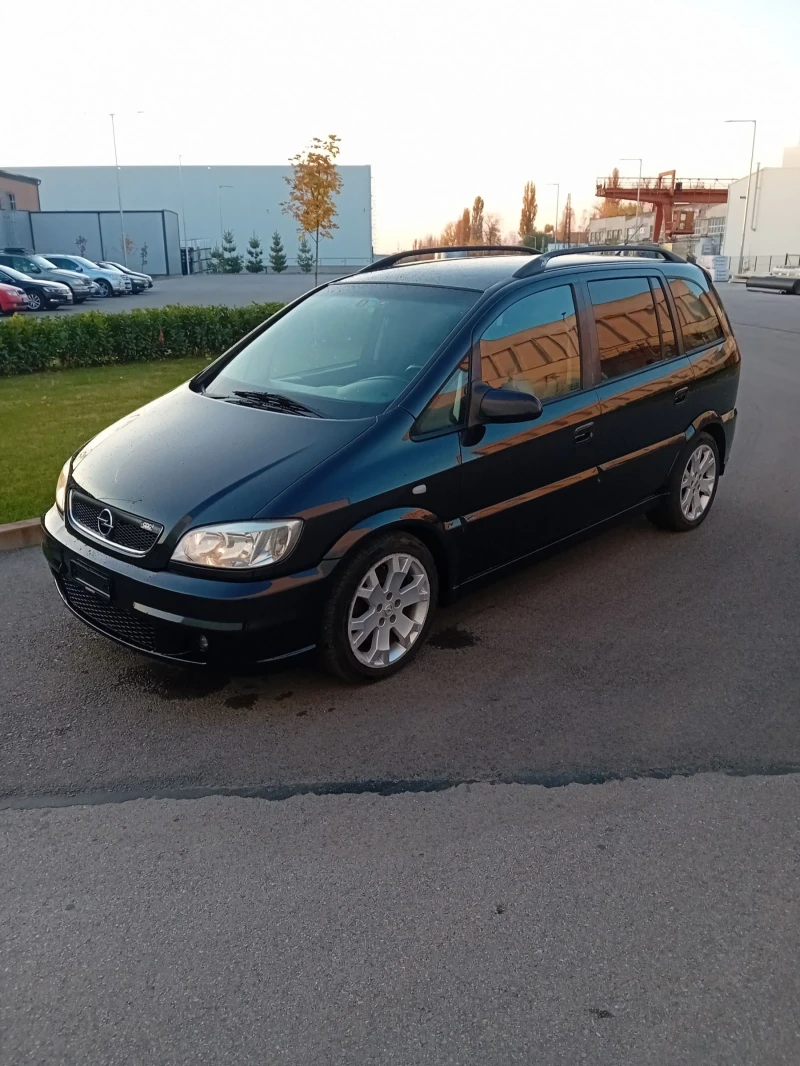 Opel Zafira 2.0т face swiss, снимка 12 - Автомобили и джипове - 47807544