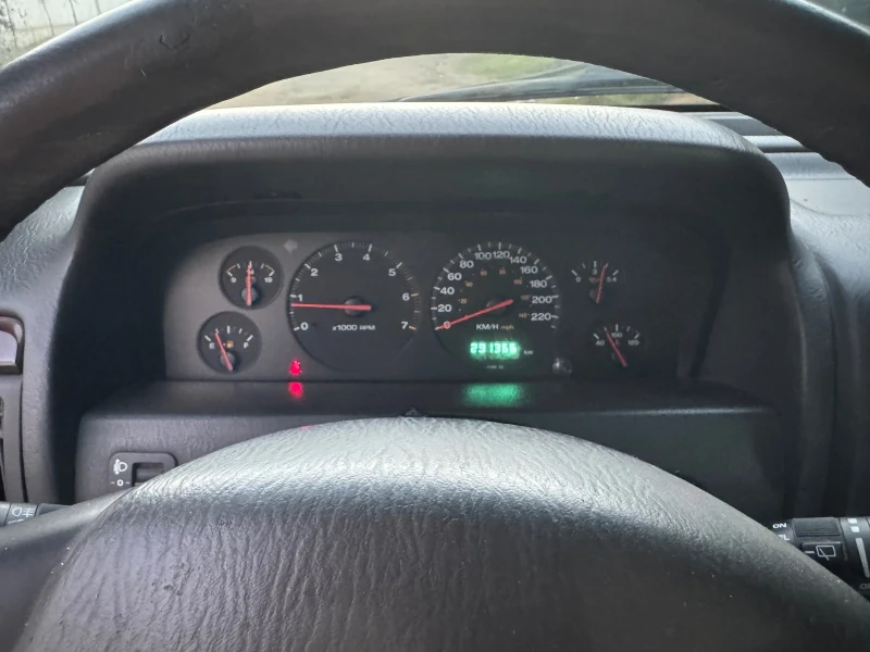 Jeep Grand cherokee 4.7 GAZ Quadra-drive, снимка 13 - Автомобили и джипове - 52394642