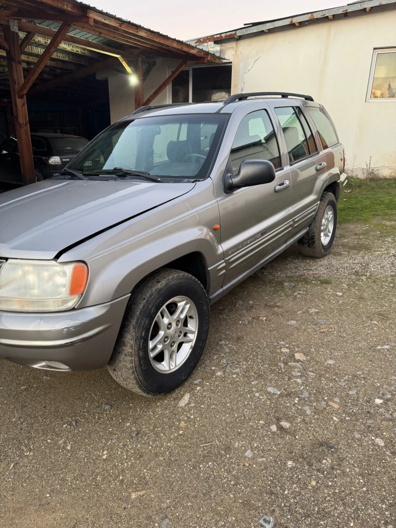 Jeep Grand cherokee 4.7 GAZ Quadra-drive, снимка 4 - Автомобили и джипове - 52394642