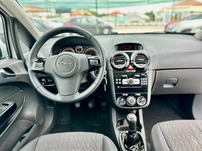 Opel Corsa 1.3CDTI-Euro 5B, снимка 11 - Автомобили и джипове - 51923273