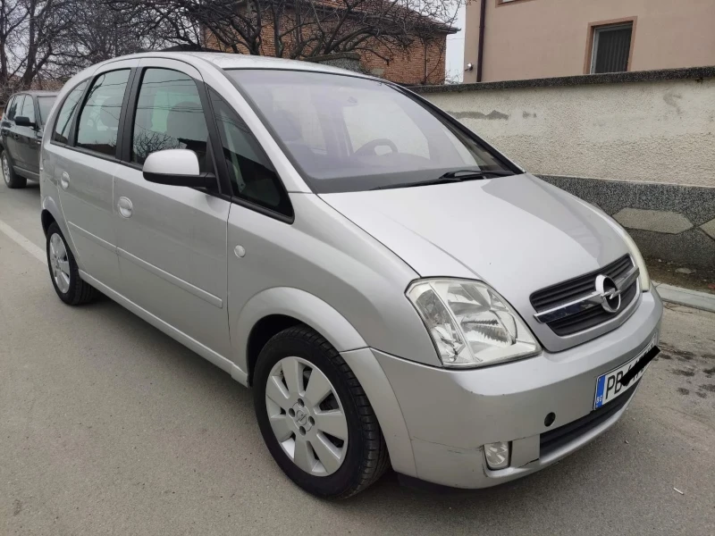 Opel Meriva, снимка 9 - Автомобили и джипове - 48286336