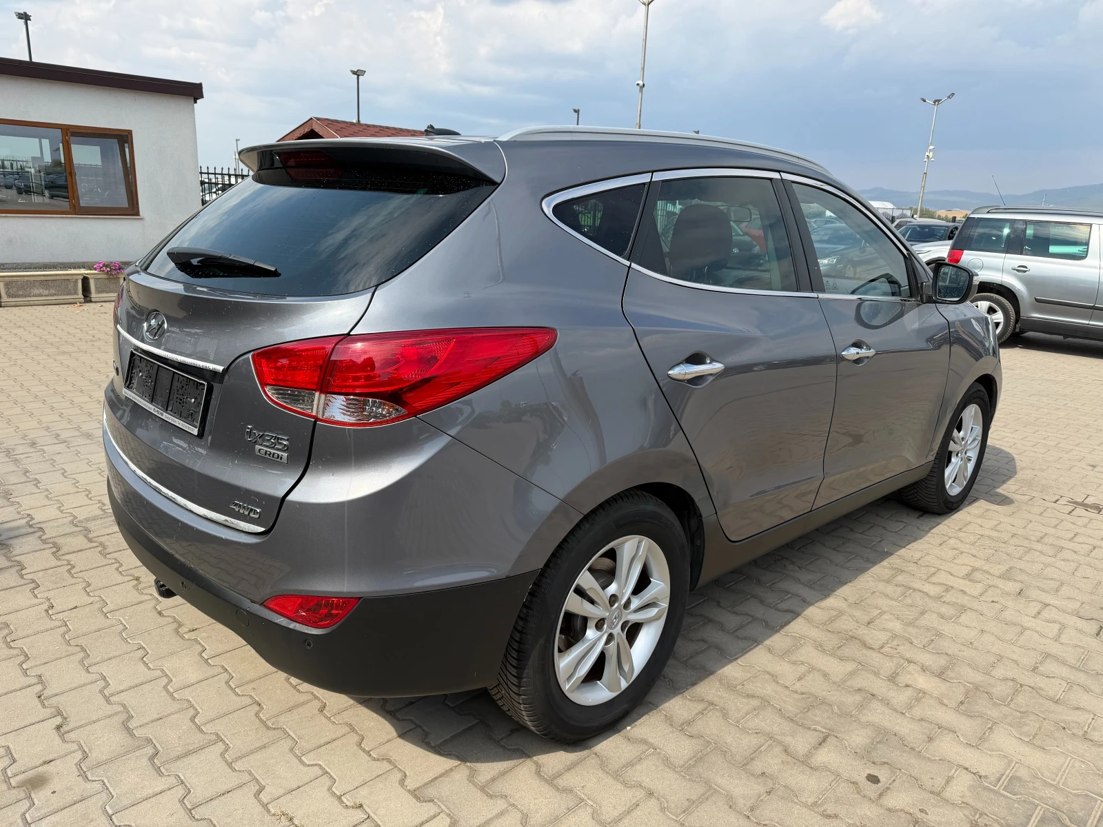 Hyundai IX35 2.0CRDI AWD AVTOMAT/NAVI/KOJA EURO 5, снимка 6 - Автомобили и джипове - 56166151