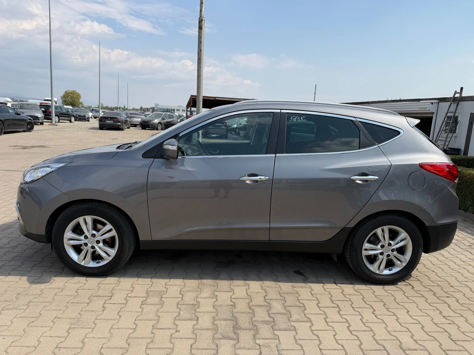 Hyundai IX35 2.0CRDI AWD AVTOMAT/NAVI/KOJA EURO 5, снимка 9 - Автомобили и джипове - 56166151