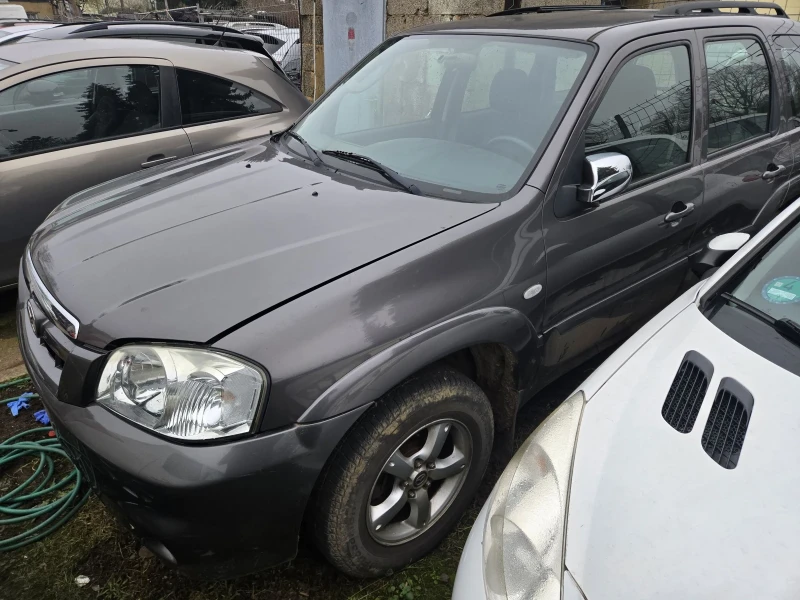 Mazda Tribute, снимка 2 - Автомобили и джипове - 49364330