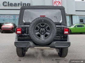 Jeep Wrangler Sport 2-Door 4WD - 60000 лв. / 30677.51 € - 58919680 5