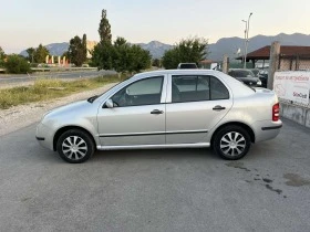 Skoda Fabia 1.4I 75кс  EURO 4 КЛИМАТИК АВТОПИЛОТ ПОДГРЕВ, снимка 6