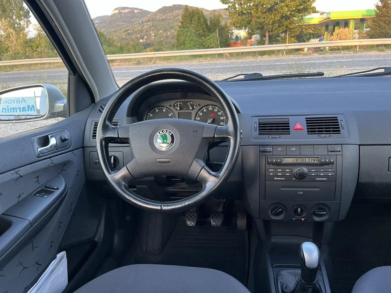 Skoda Fabia 1.4I 75кс  EURO 4 КЛИМАТИК АВТОПИЛОТ ПОДГРЕВ, снимка 12 - Автомобили и джипове - 46626126