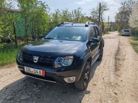 Dacia Duster 1.6i, снимка 1