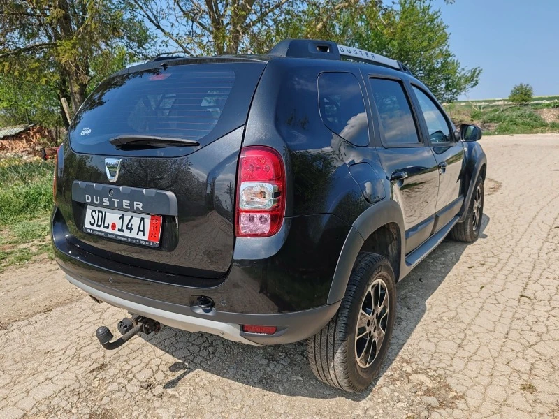 Dacia Duster 1.6i, снимка 5 - Автомобили и джипове - 46512257