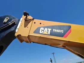 Телескопичен товарач Caterpillar TH 407C, снимка 15