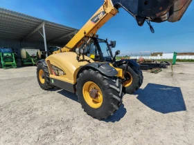 Телескопичен товарач Caterpillar TH 407C, снимка 5