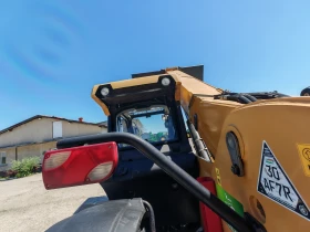 Телескопичен товарач Caterpillar TH 407C, снимка 8