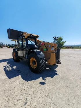 Телескопичен товарач Caterpillar TH 407C, снимка 4